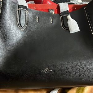 Selling new DRBY TOTE black Coach bag.